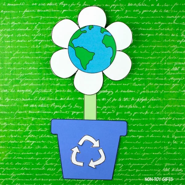 Earth flower growing in a recycling flowerpot