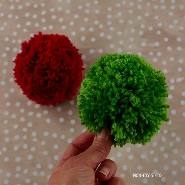 green and red pom poms