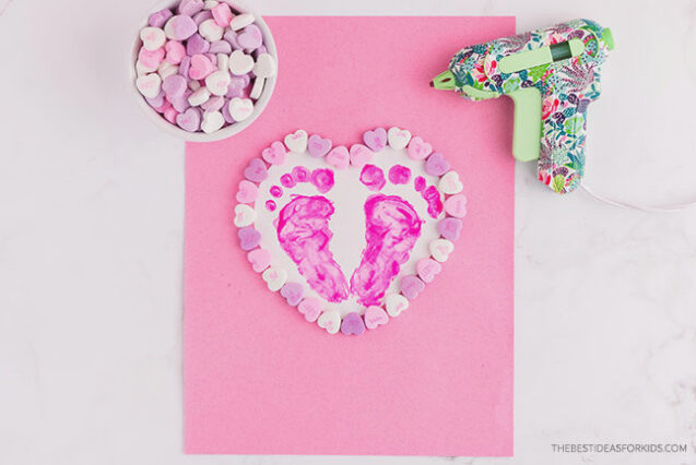 Attach conversation hearts with hot glue