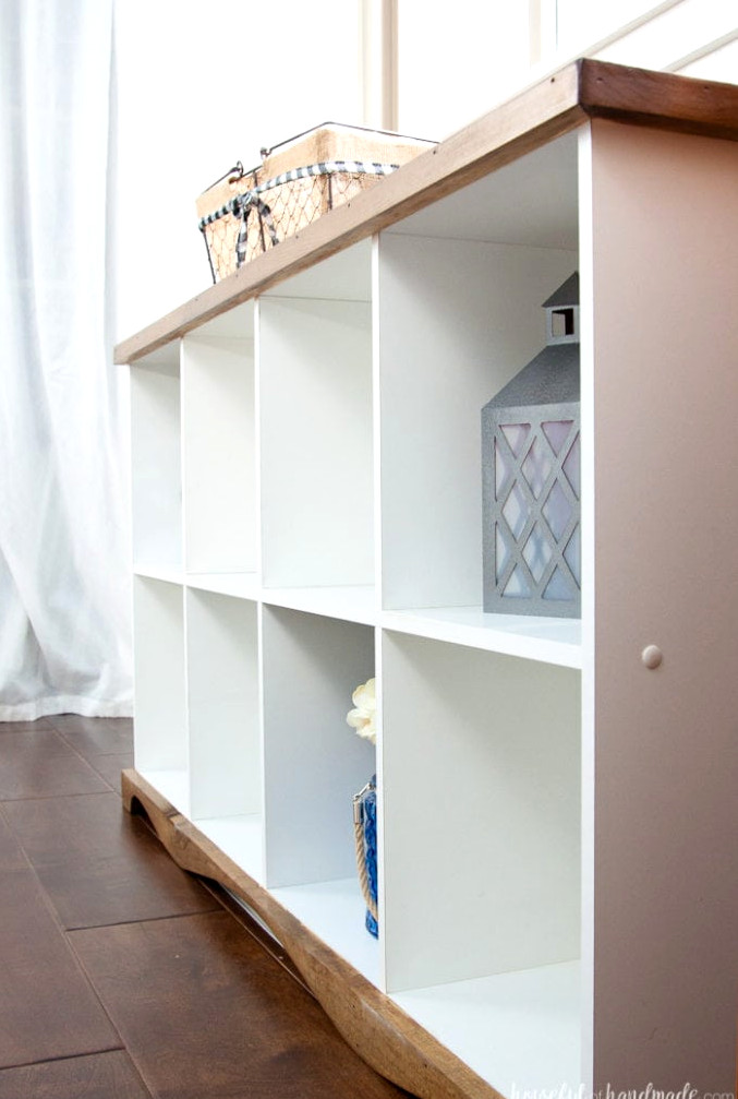 Instead of discarding old melamine bookcases, transform one into a lovely farmhouse-style console table. This simple DIY upcycling project is affordable and easy to complete. Housefulofhandmade.com | Farmhouse Bookcase | Free Building Plans | DIY Console Table | Repurposed Bookcase | Cube Bookcase Storage | Budget Transformation | $100 Room Challenge