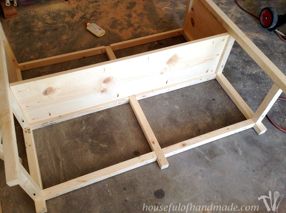 Attaching the top shelf of the coffee station table to the 2x2 sides with pocket holes.