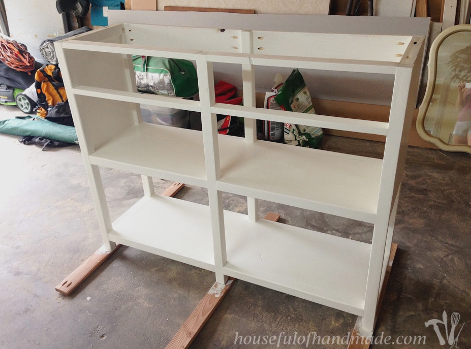 Completed base of the coffee station console table painted white.