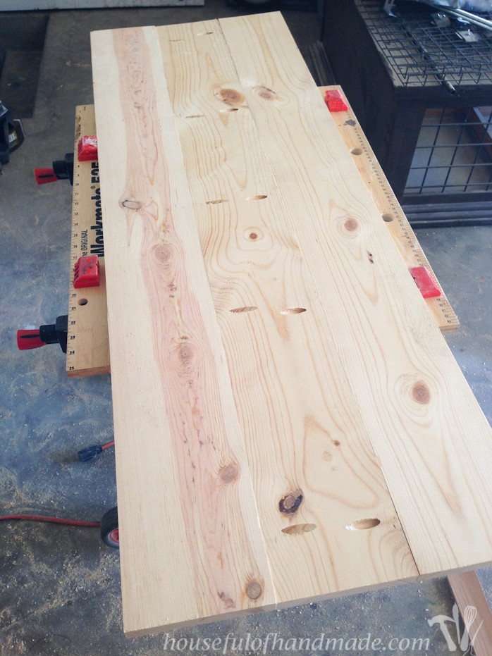 Attaching 3 long boards together to create the top for the coffee bar table.