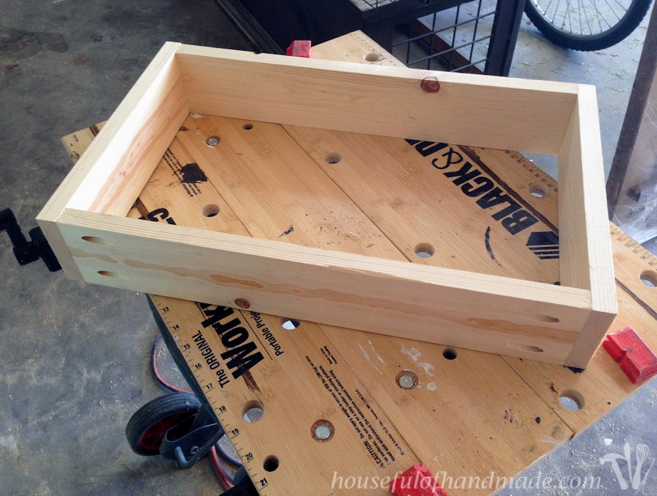 Four 1x4 boards assembled in a square for the drawer box.