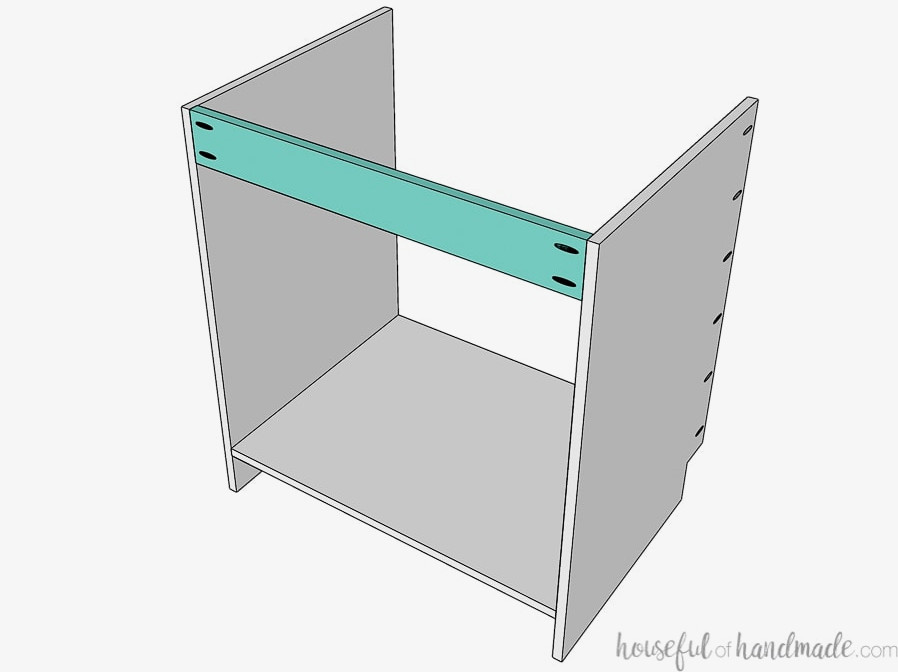 Installing the rear support piece onto the cabinet box.