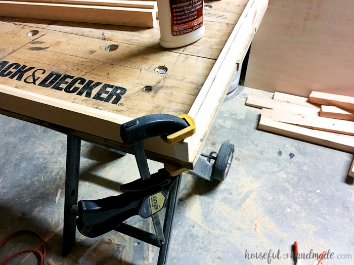 Create the perfect place to organize your most used supplies! Learn how to hang pegboard so it is removable if needed. Housefulofhandmade.com | Craft organization ideas | Craft room remodel | Pegboard organization | $100 Room Challenge | Easy woodworking | Easy building plans | Free Building plans