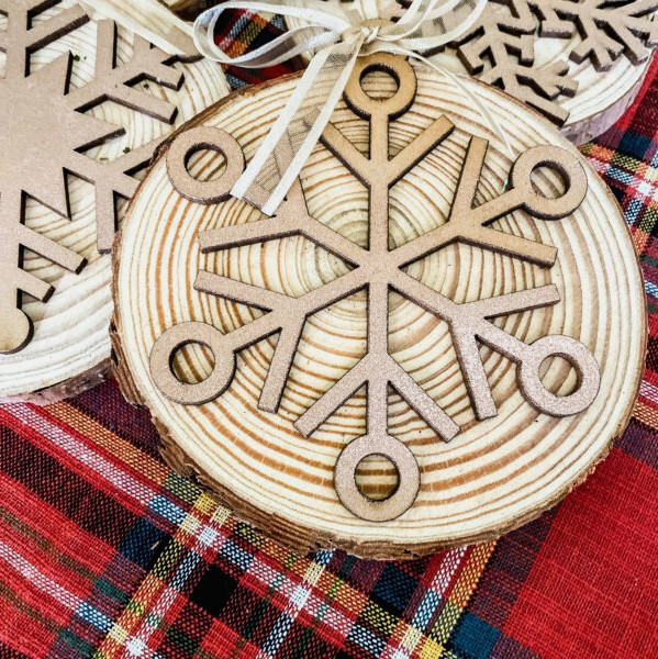 wood slice ornament with snowflakes