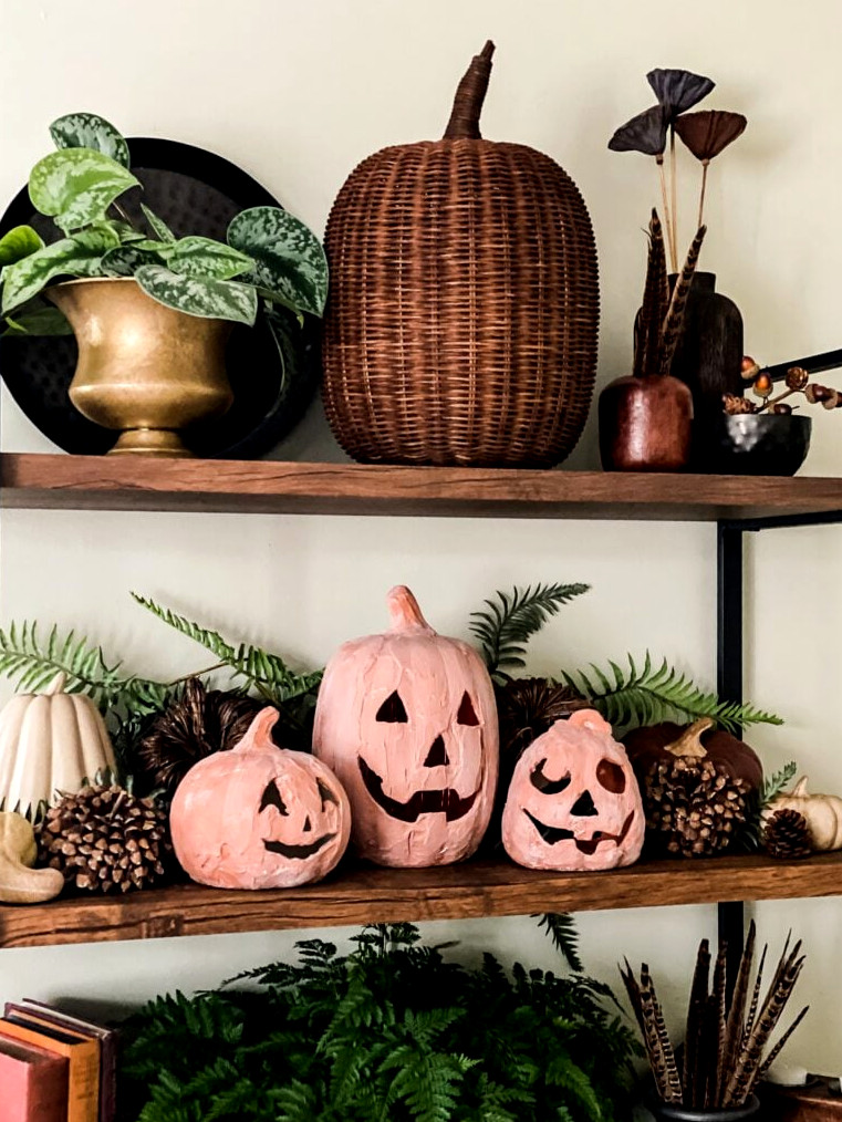autumn shelf arrangement with terracotta pumpkins