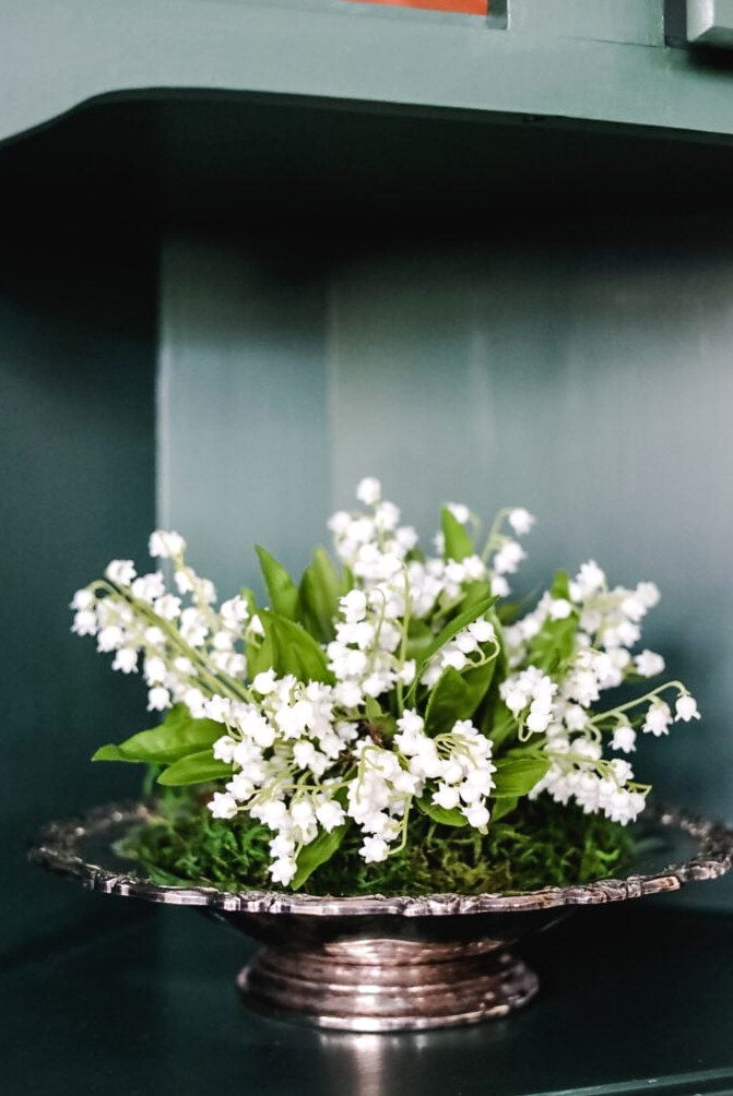 lily of the valley arrangement in silver bowl