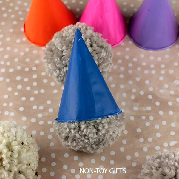 glue pom pom and cup together