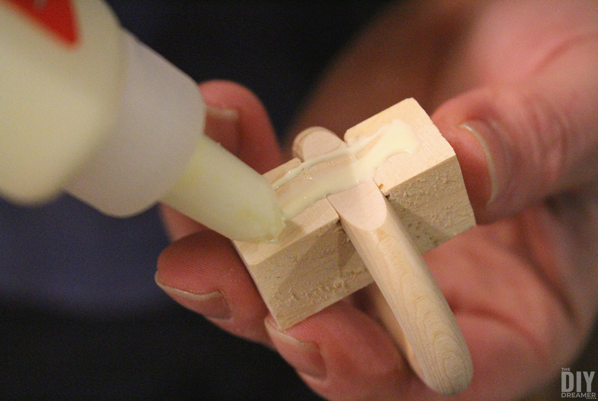 Applying glue under the ring block.