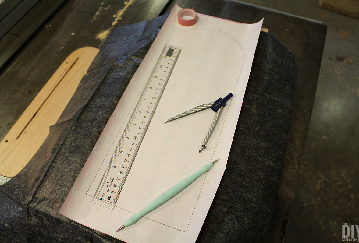 Tracing template onto wood.