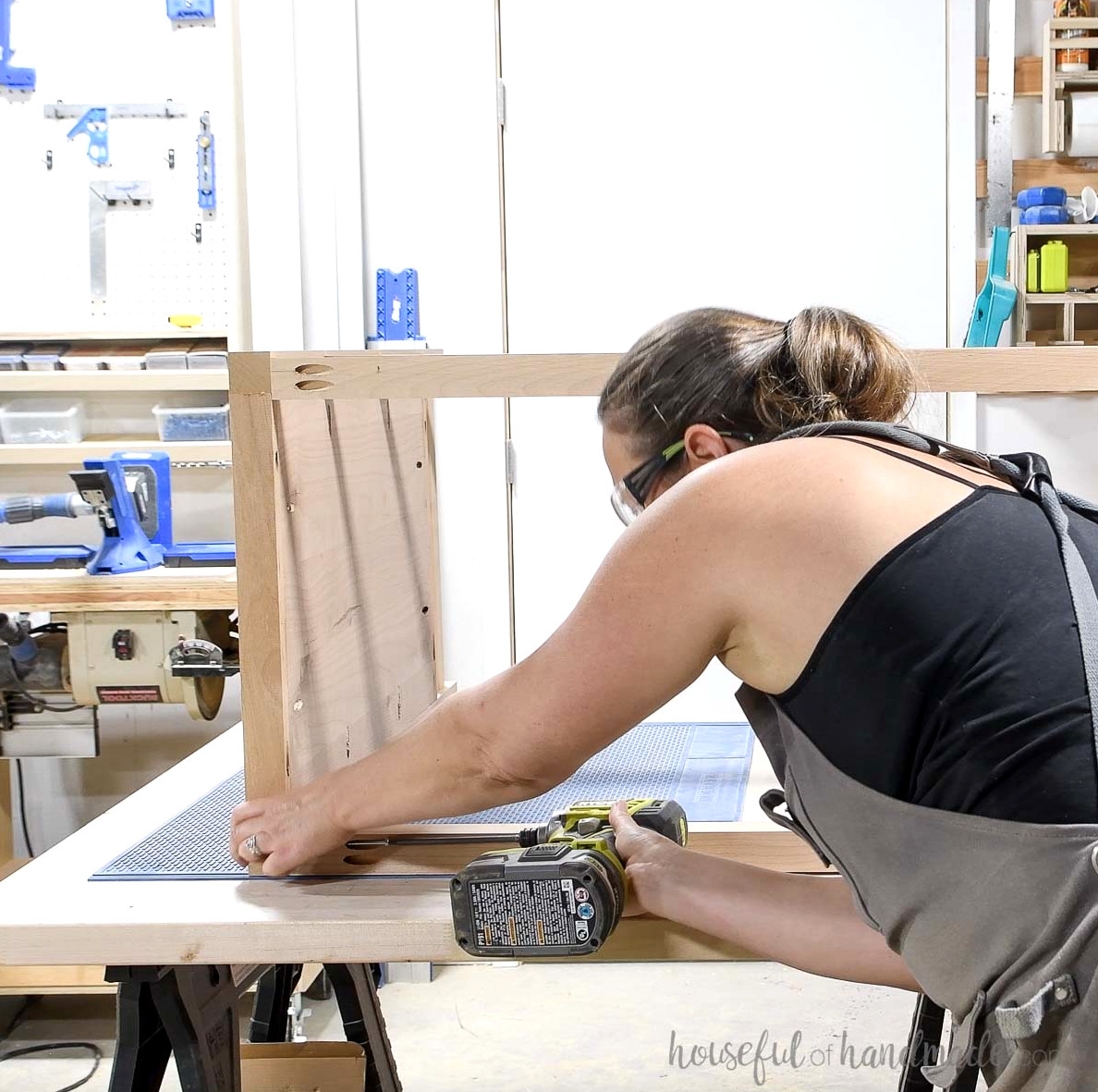 Attaching 2x2 boards for the back of the dresser. 