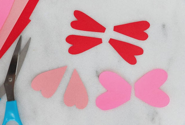 Cutting out paper love bug wings