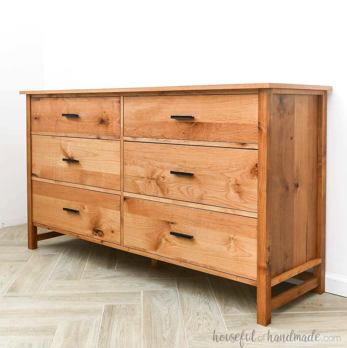 Traditional large dresser featuring 6 drawers, with 3 drawers on each side.