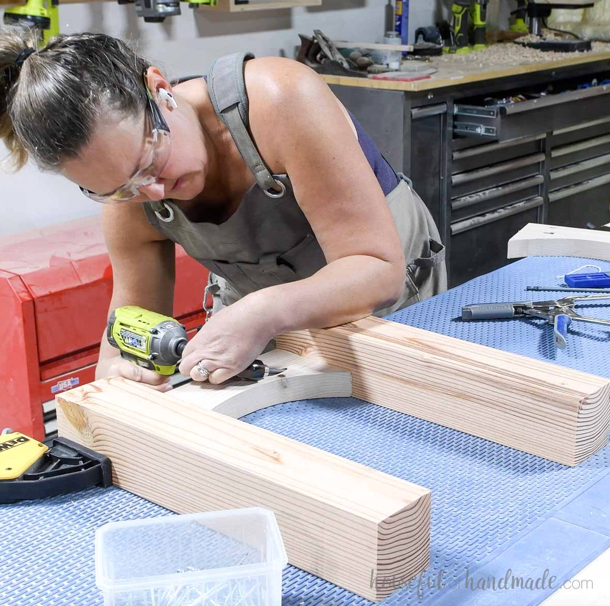 Attaching arched board between two chunky legs with pocket hole screws.