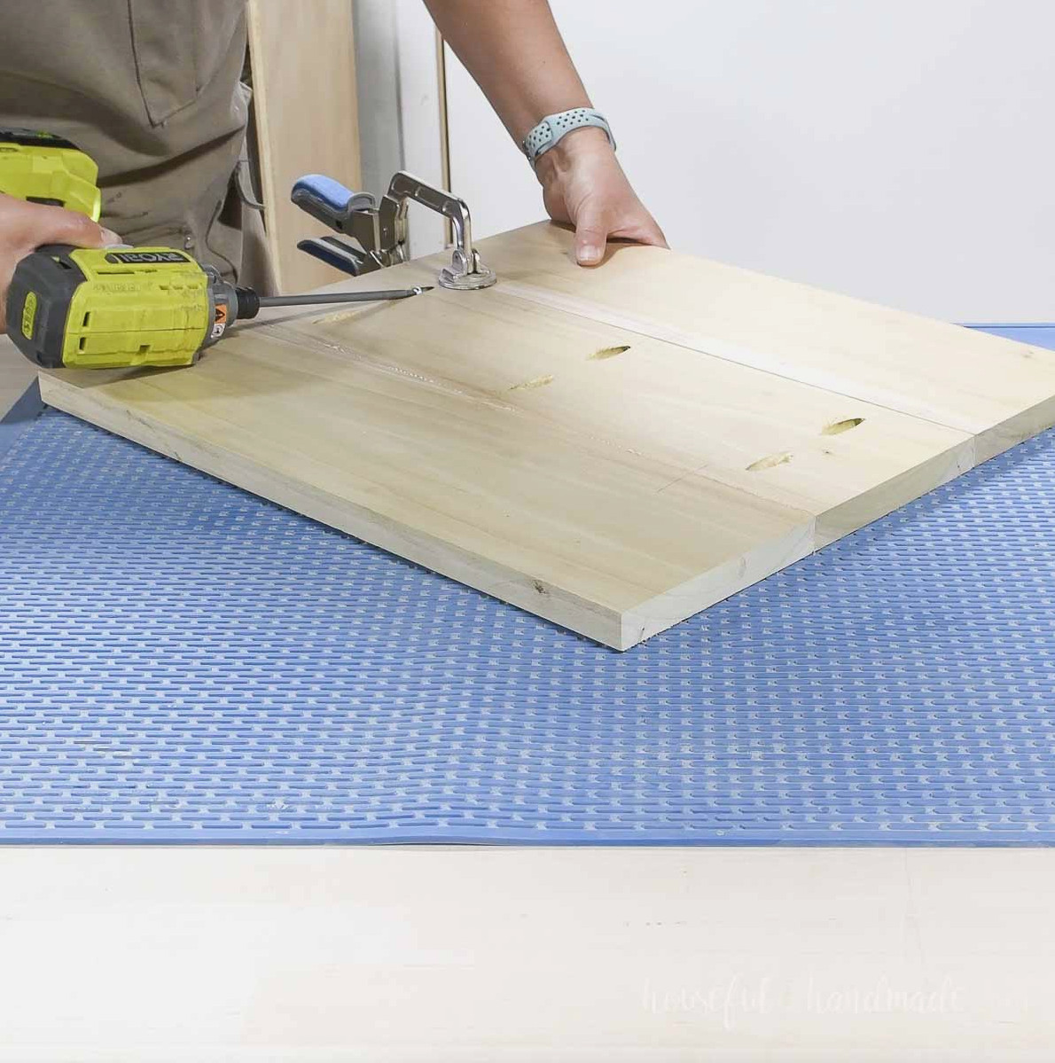 Glueing 3 boards together along the edges and securing with pocket holes.