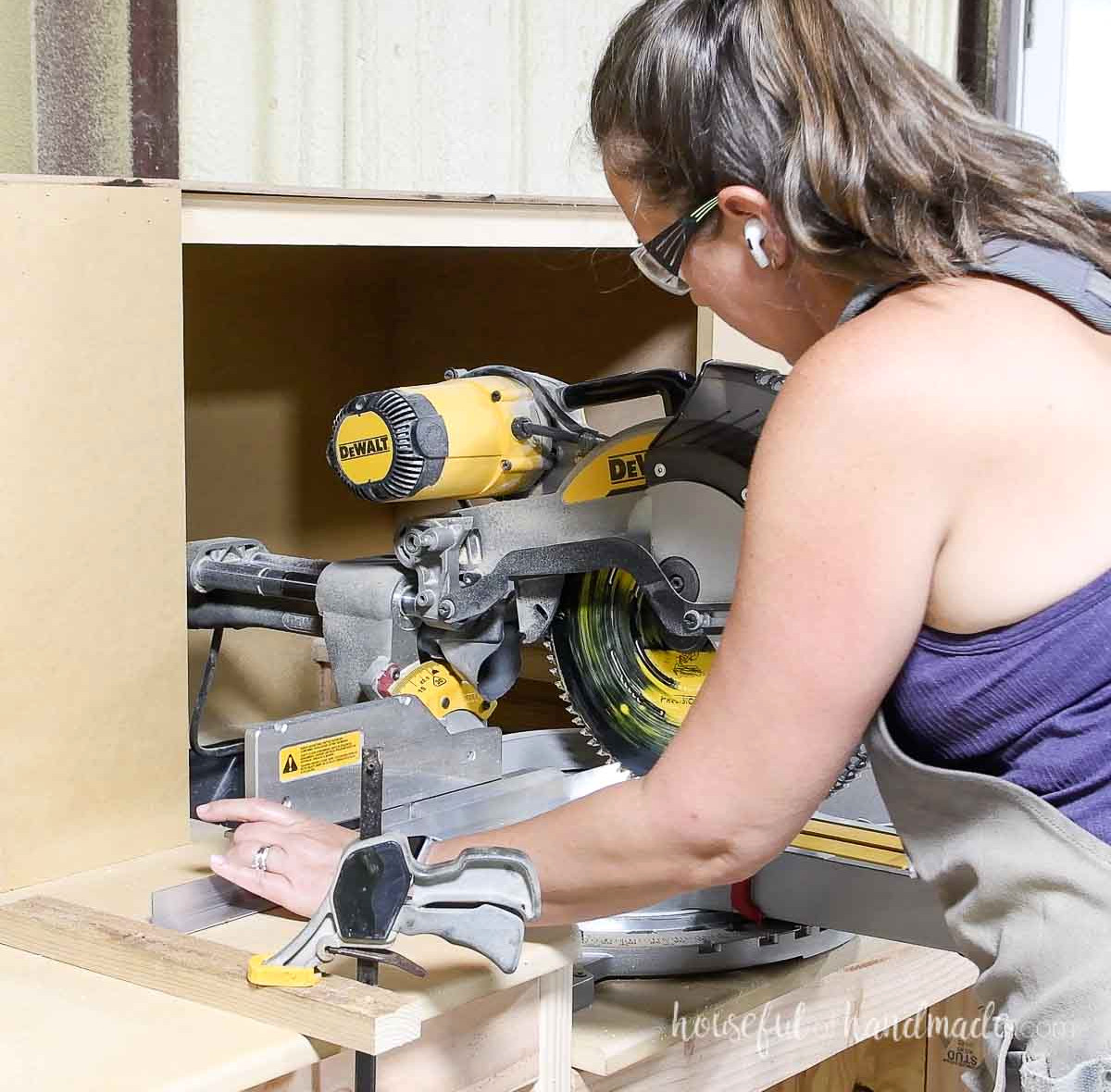 Cutting angle iron on a miter saw.