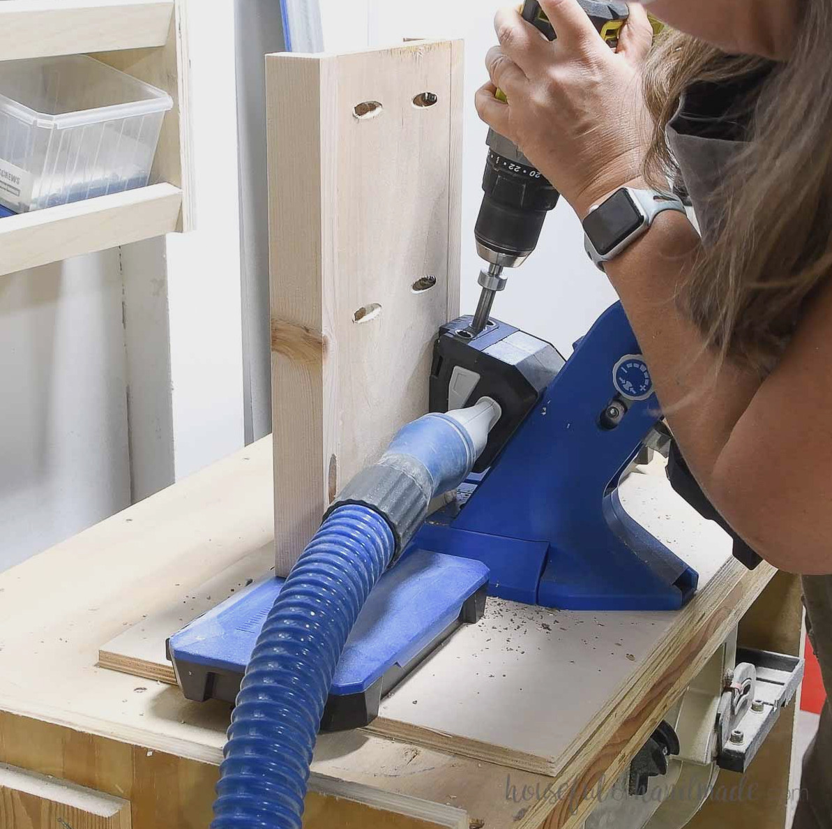 Drilling pocket holes in side rails once assembled.