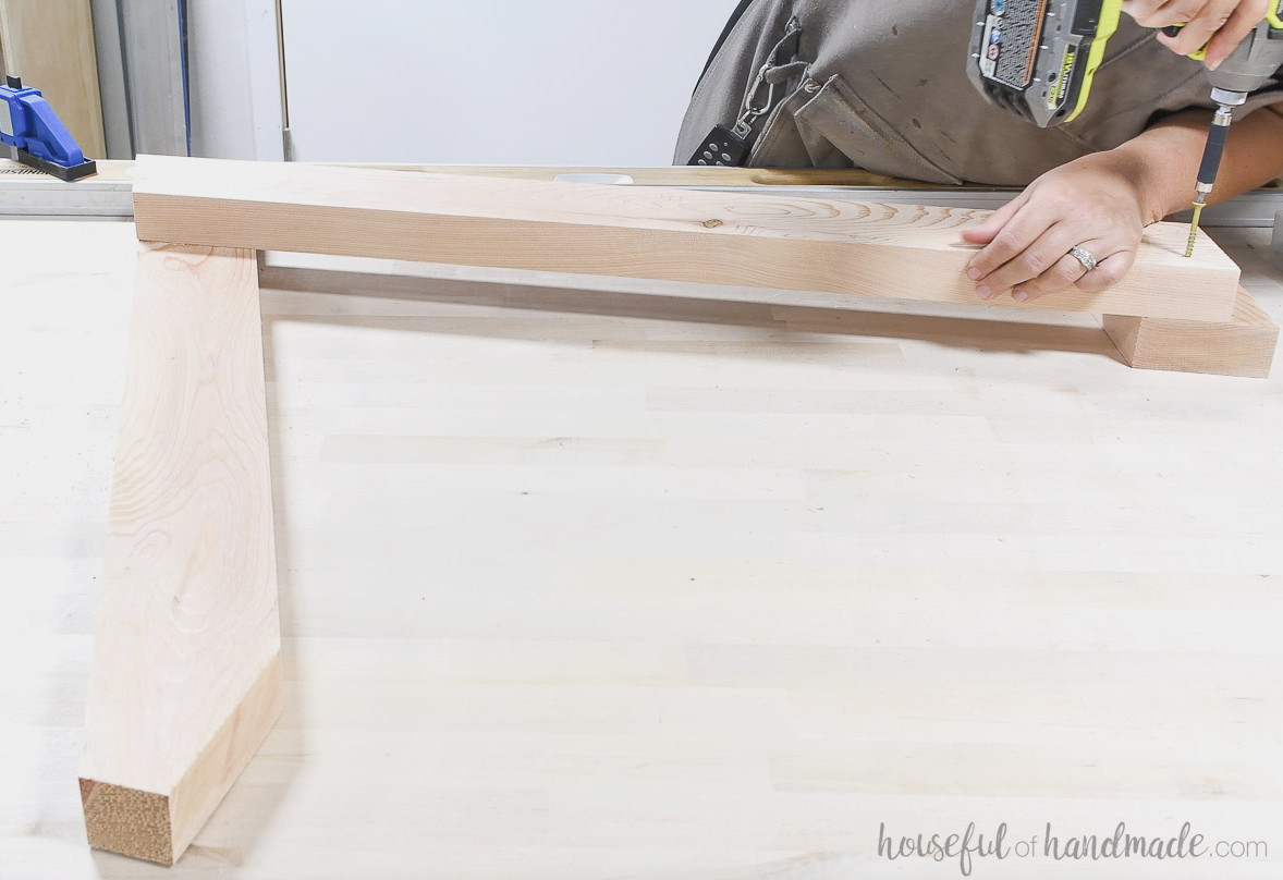 Assembling the other side of the adirondack chair.