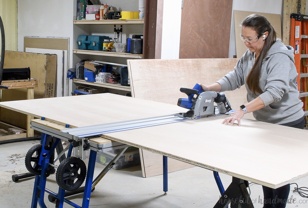 Cutting a sheet of 3/4" plywood with a plunge saw on the Kreg ACS. 