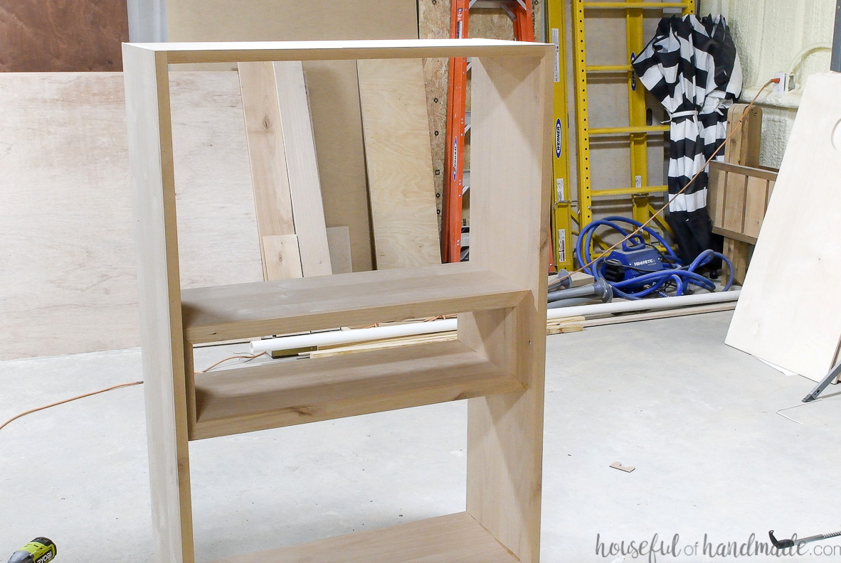 Completed cabinet box with display cubby inside but no back. 