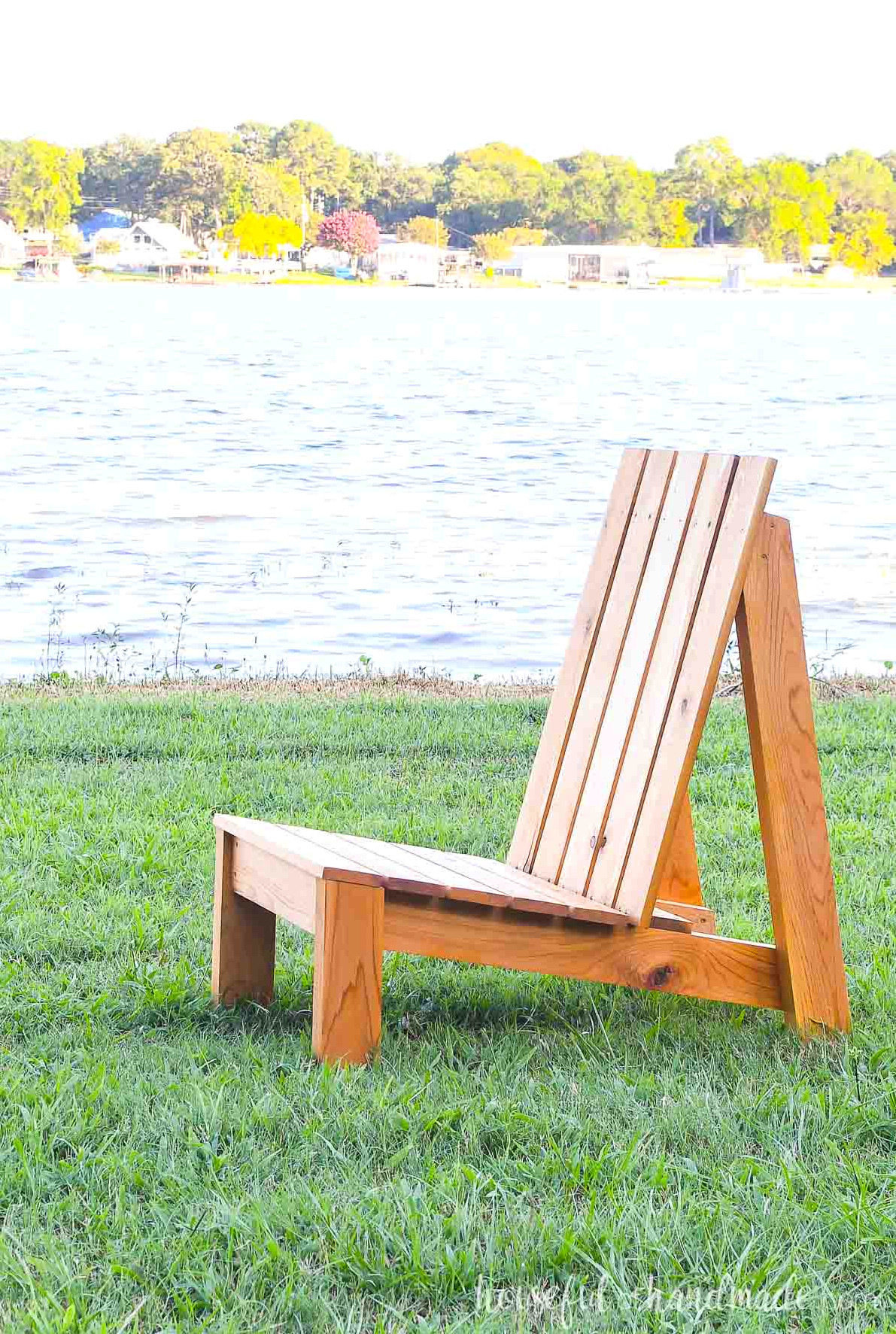 Side perspective of a cedar adirondack chair featuring clean lines and no armrests.