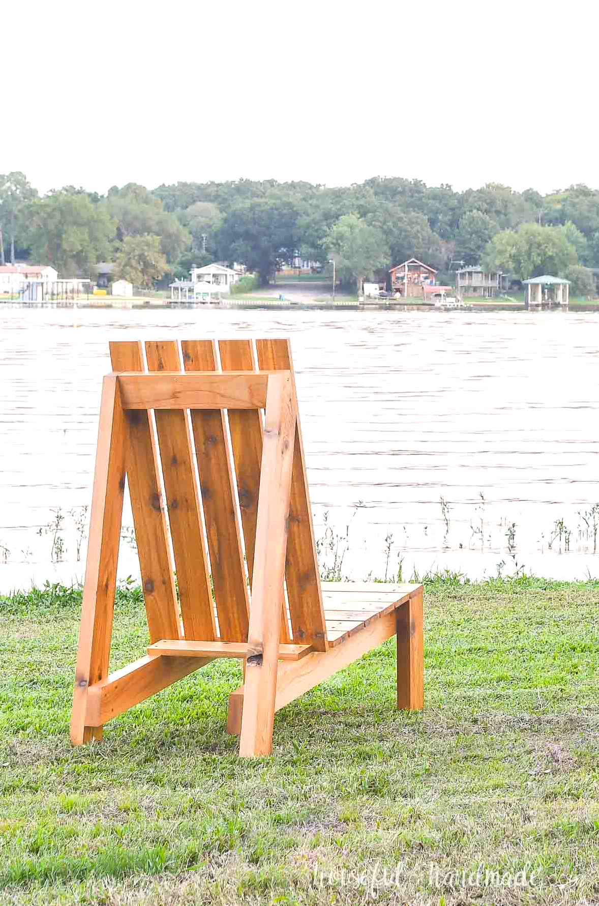 Rear view of the larger outdoor chair overlooking a lake.