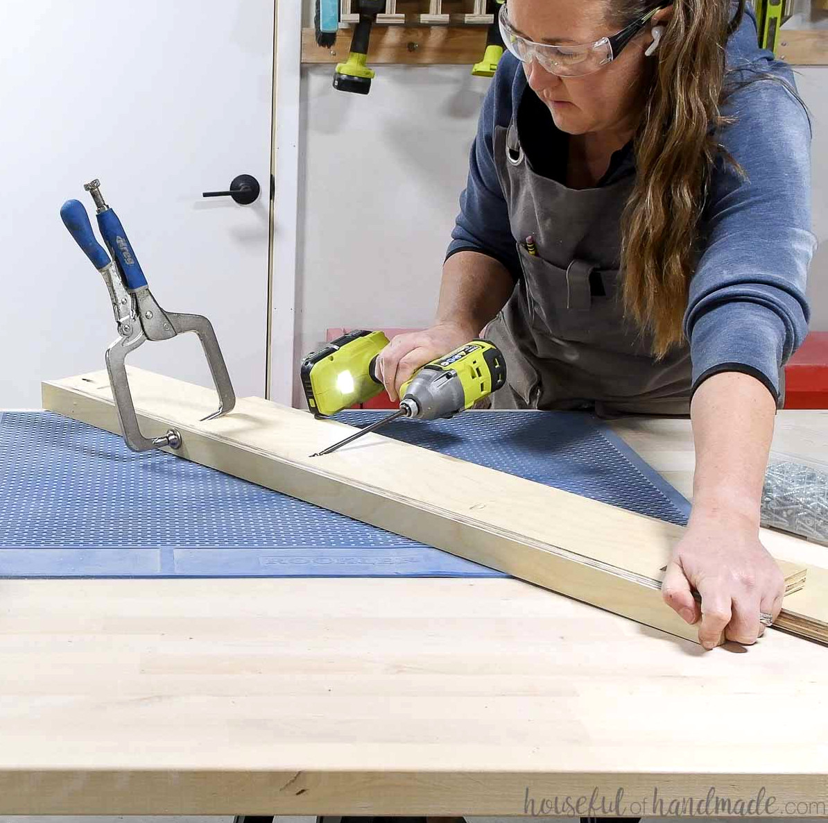 Attaching the front of the shelf pieces to the shelf boards with pocket holes.