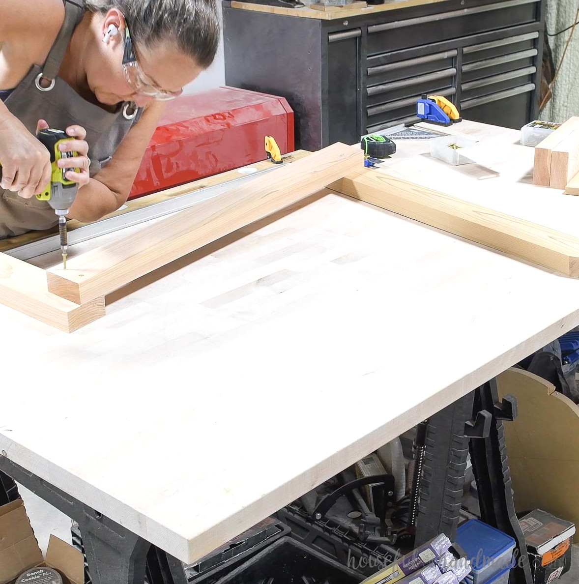 Putting together one side of the XL adirondack chair.