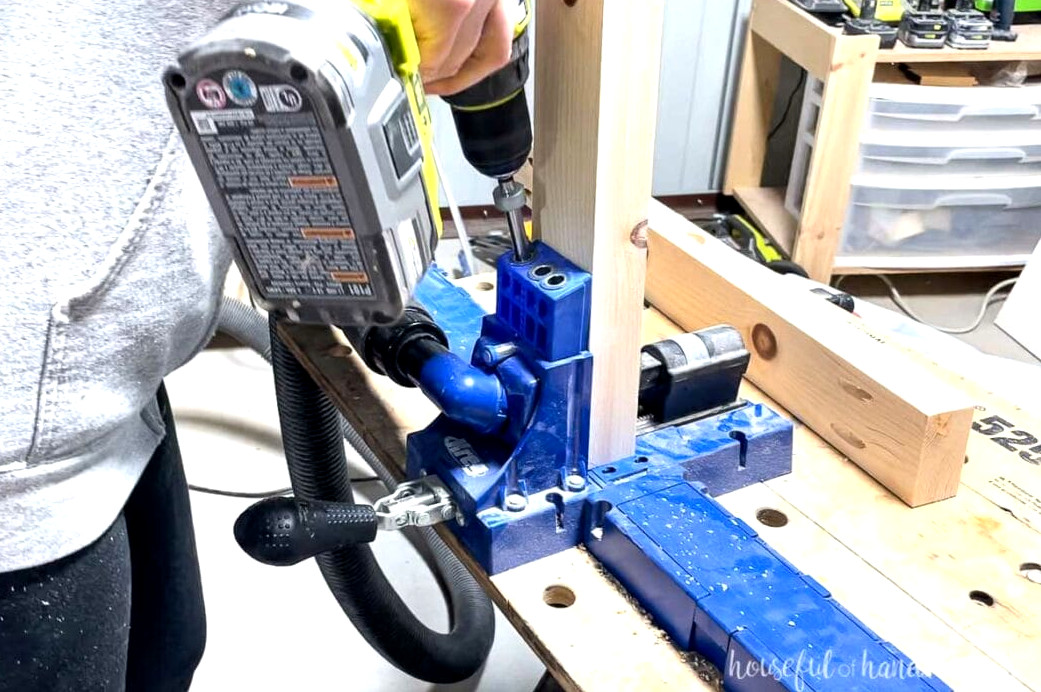 Pocket holes being drilled into the upper skirt components with a Kreg jig.