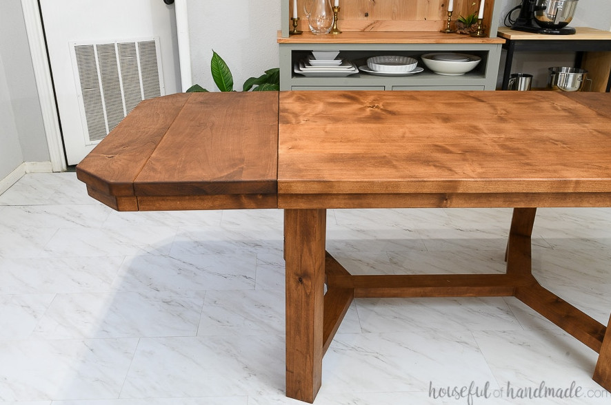 Image showing one half of the dining table with a breadboard leaf inserted.