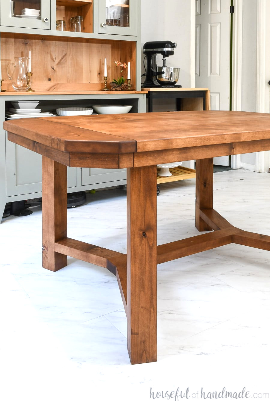 Compact DIY dining table seating 4-6 people with the leaves left out.