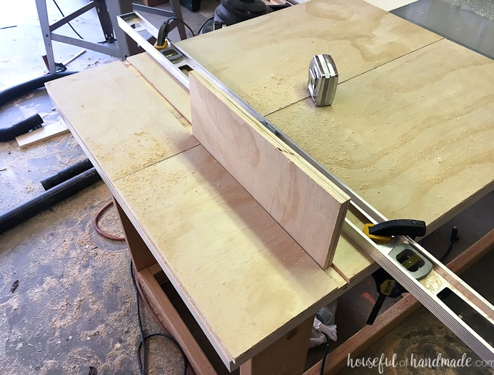 Two custom closet side panels with a routed groove across the top for a shelf.