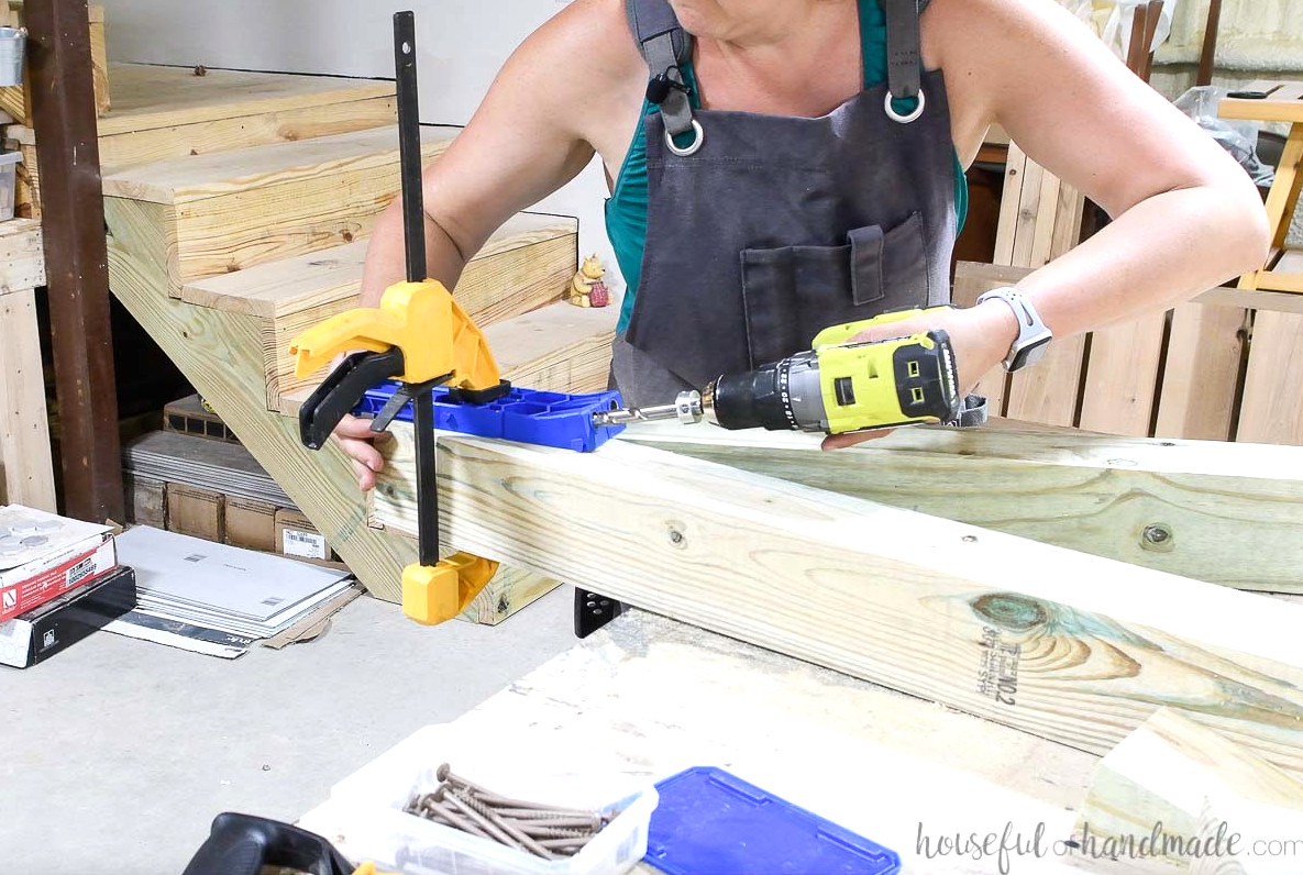 Making XL pocket holes near the top of the hanging chair stand legs.