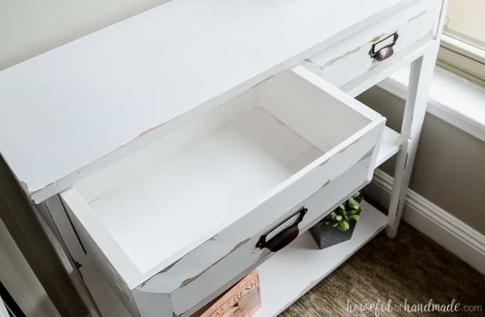 The interior of the spacious top drawer on the small console table. Lots of room for keeping items organized. Housefulofhandmade.com