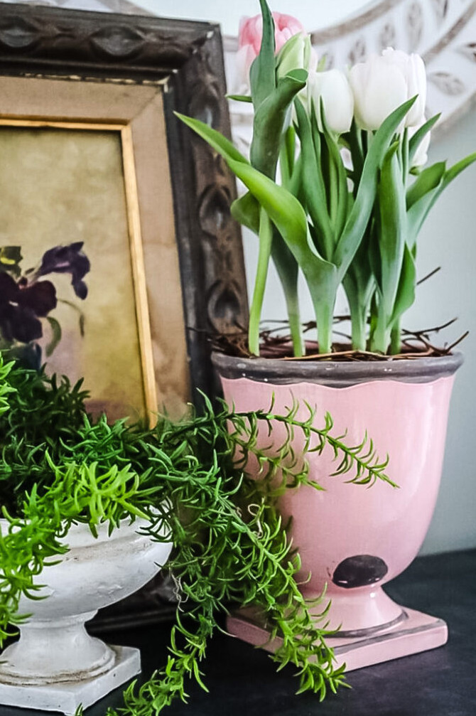 pink pastel vase with flowering tulips