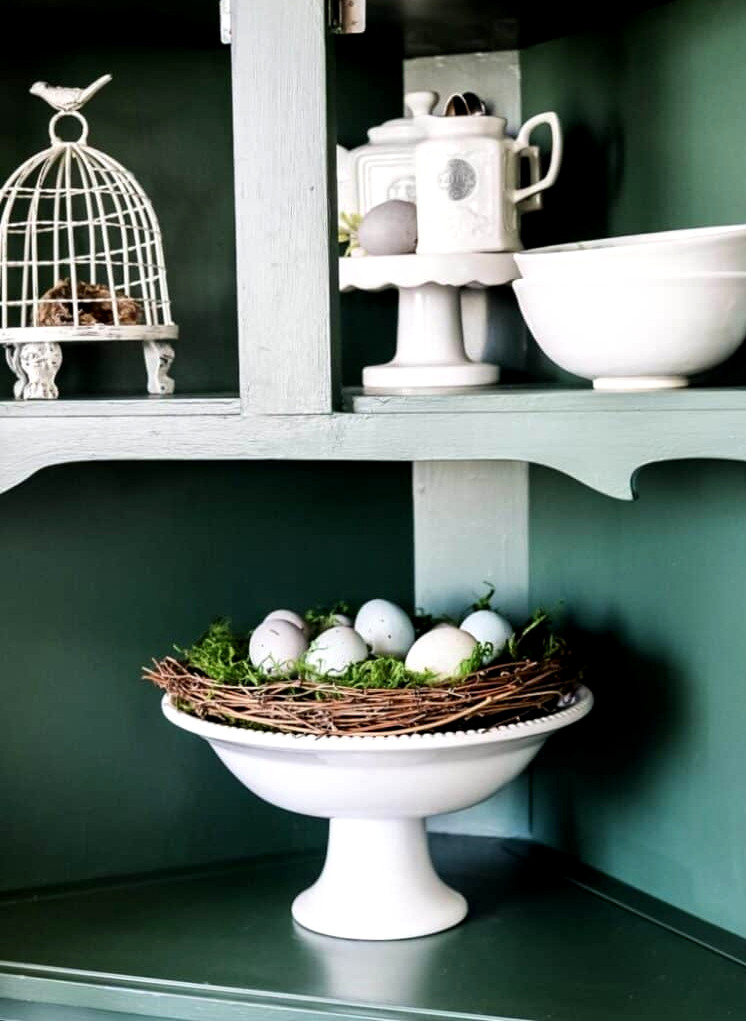 Kitchen china cabinet decorated for Spring