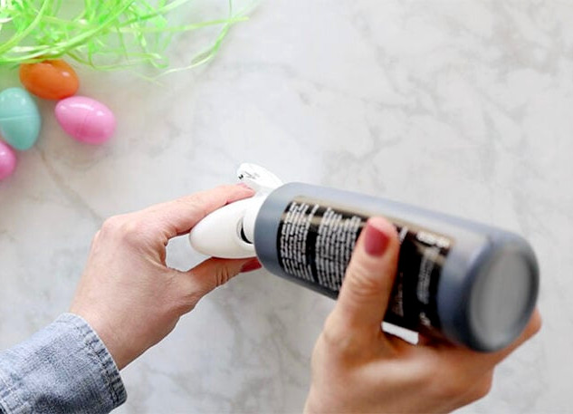 Pouring paint into glue bottle