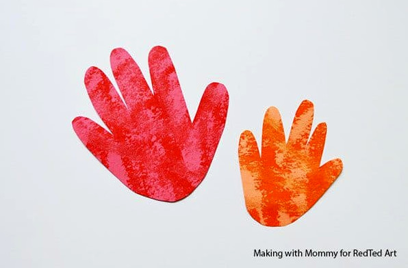 handprints from dad and child for fire rocket