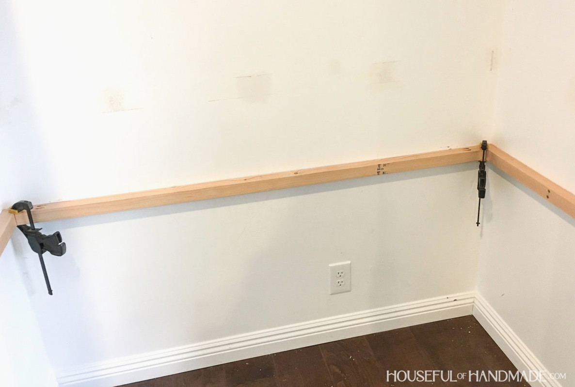 Desk frame sides and back assembled in a nook with 2x2 boards.