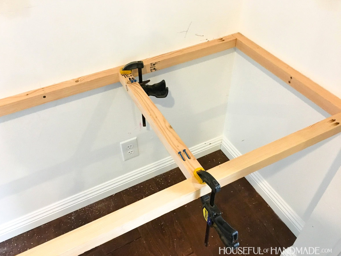Closet interior showing a desk frame with center supports fastened using pocket holes.