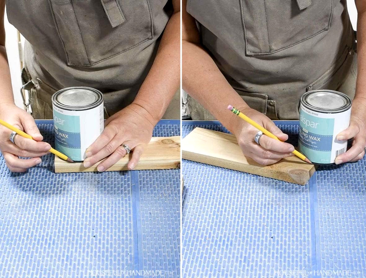 Using a small paint can to draw curves on 1x4 boards. 