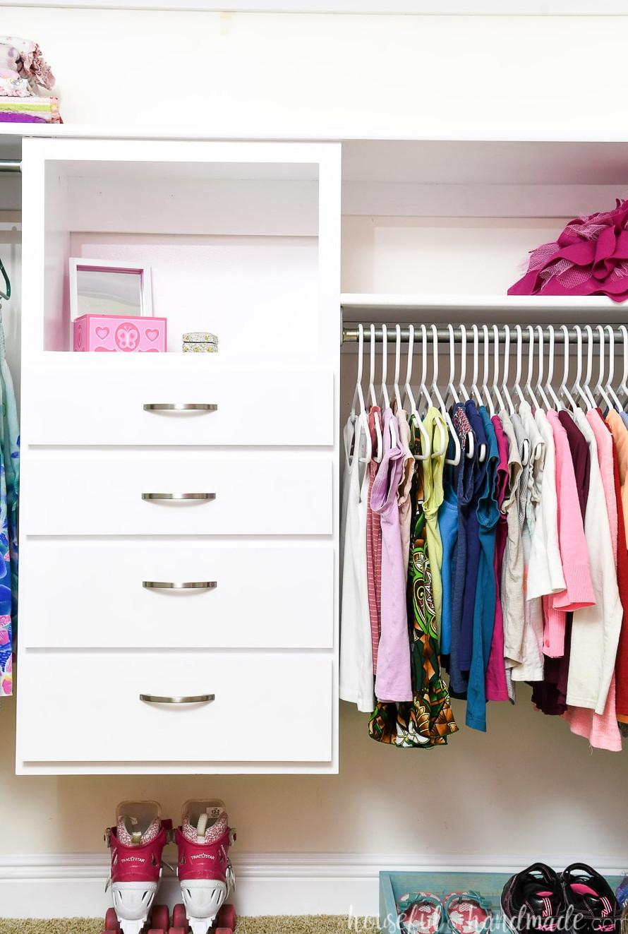 Closet organization system added to the clothing closet for more storage.