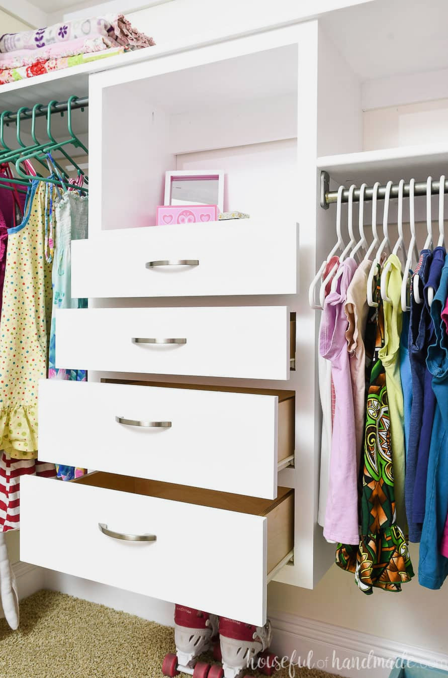 Found drawers of the DIY closet system open showing the sides.