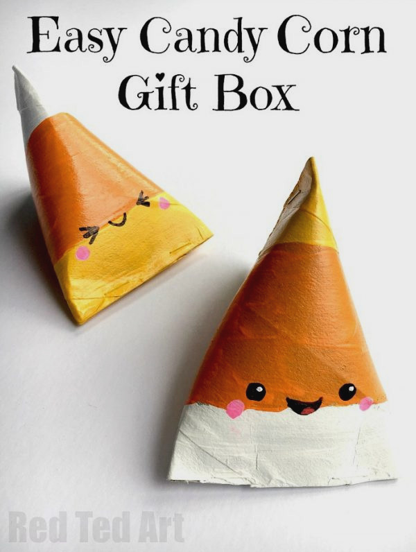 Candy Corn Gift Box DIY - incredibly cute TP Roll Treat Boxes for Halloween. Aren't they adorable? They're also quick and simple to create!! Happy Trick or Treating!