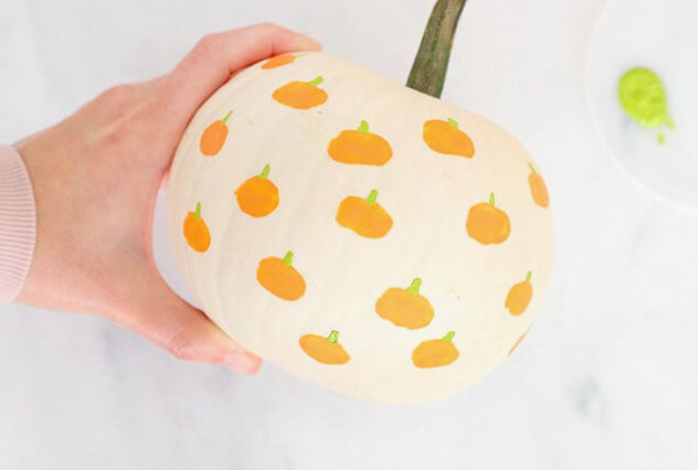 Painting stems onto pumpkins