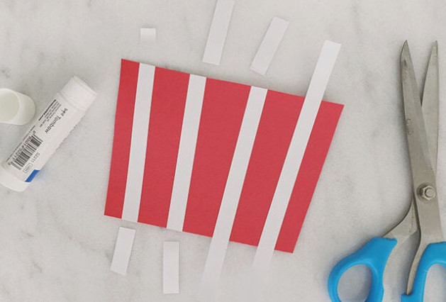 Attach strips to the popcorn bag