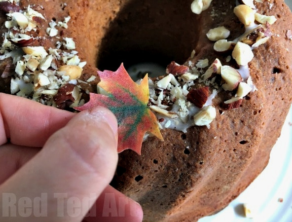 Thanksgiving Cake Decorating Ideas - How cute is this Fall Cake? Completely edible and oh so cute! We made this as my Mother in Law's Birthday Cake. The kids helped make the cake, hedgehogs and mushrooms.. the assembly of this Birthday/ Thanksgiving cake is super easy too!