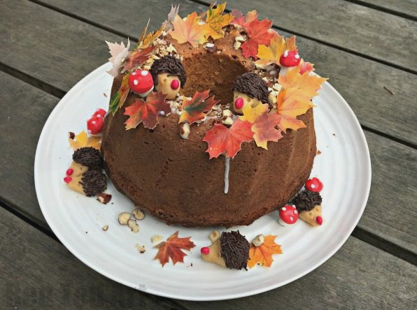 Thanksgiving Cake Decorating Ideas - How cute is this Fall Cake? Completely edible and oh so cute! We made this as my Mother in Law's Birthday Cake. The kids helped make the cake, hedgehogs and mushrooms.. the assembly of this Birthday/ Thanksgiving cake is super easy too!